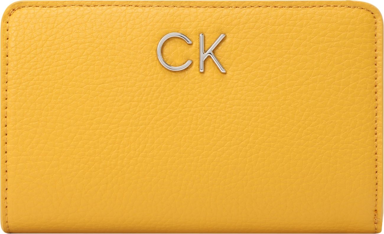 Calvin Klein Peněženka žlutá / zlatá